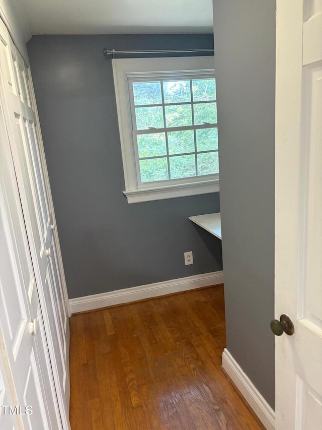119 Watson St, Enfield, NC 27823 - unfurnished bedroom featuring wood finished floors and baseboards