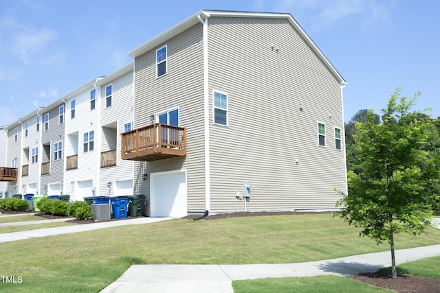 2401 Laurel Valley Way, Raleigh, NC 27604 - view of side of property featuring a garage, a lawn, cooling unit, a balcony, and concrete driveway
