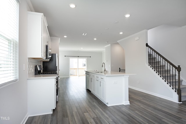 2401 Laurel Valley Way, Raleigh, NC 27604 - kitchen with a sink, stainless steel appliances, dark wood finished floors, white cabinets, and recessed lighting