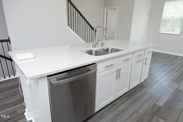 2401 Laurel Valley Way, Raleigh, NC 27604 - kitchen featuring dishwasher, a sink, an island with sink, dark wood-type flooring, and white cabinetry
