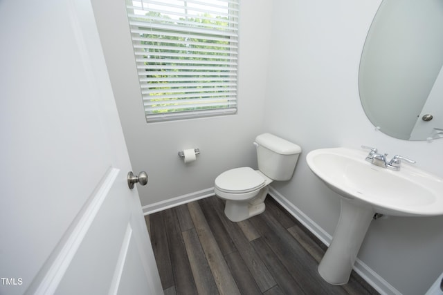 2401 Laurel Valley Way, Raleigh, NC 27604 - bathroom with toilet, baseboards, and wood finished floors