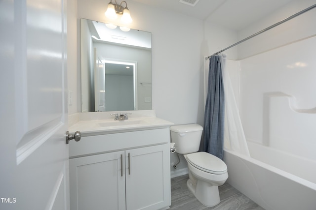 2401 Laurel Valley Way, Raleigh, NC 27604 - bathroom with toilet, vanity, shower / bath combo, and wood finished floors