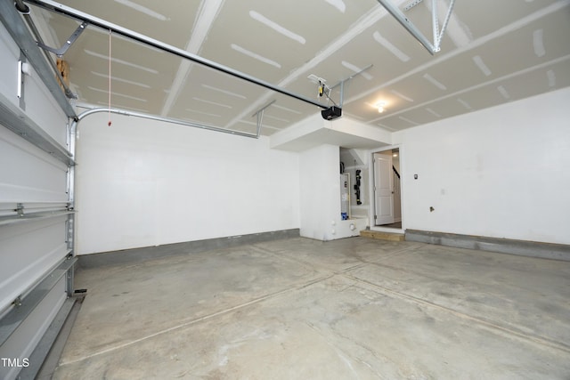2401 Laurel Valley Way, Raleigh, NC 27604 - garage featuring a garage door opener and baseboards