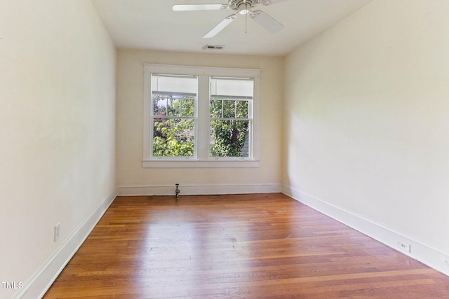 1308-10 Wake Forest Rd, Raleigh, NC 27604 - empty room with wood finished floors, ceiling fan, and baseboards