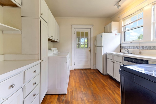 1308-10 Wake Forest Rd, Raleigh, NC 27604 - kitchen with washing machine and clothes dryer, crown molding, freestanding refrigerator, healthy amount of natural light, and stainless steel dishwasher