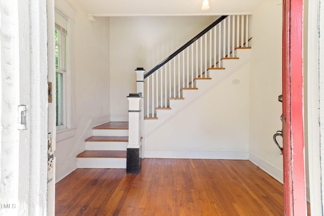 1308-10 Wake Forest Rd, Raleigh, NC 27604 - entrance foyer featuring stairway, hardwood / wood-style floors, and baseboards