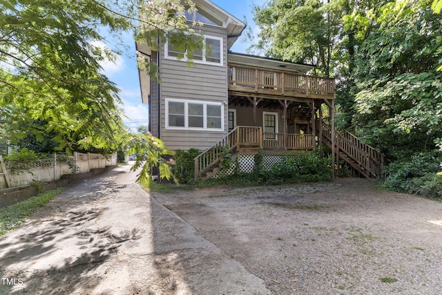 1308-10 Wake Forest Rd, Raleigh, NC 27604 - view of front facade with stairs and a wooden deck