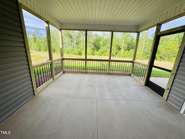 unfurnished sunroom with a healthy amount of sunlight
