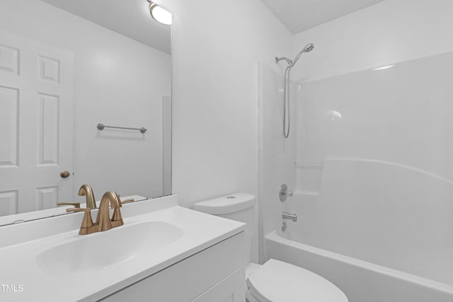 full bath featuring shower / bathtub combination, toilet, and vanity