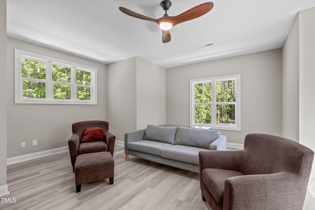59 Mill Rd, Pittsboro, NC 27312 - living room with plenty of natural light, a ceiling fan, light wood-style flooring, and baseboards