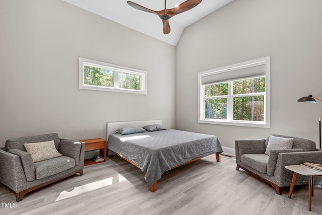 59 Mill Rd, Pittsboro, NC 27312 - bedroom with multiple windows, wood finished floors, lofted ceiling, and a ceiling fan