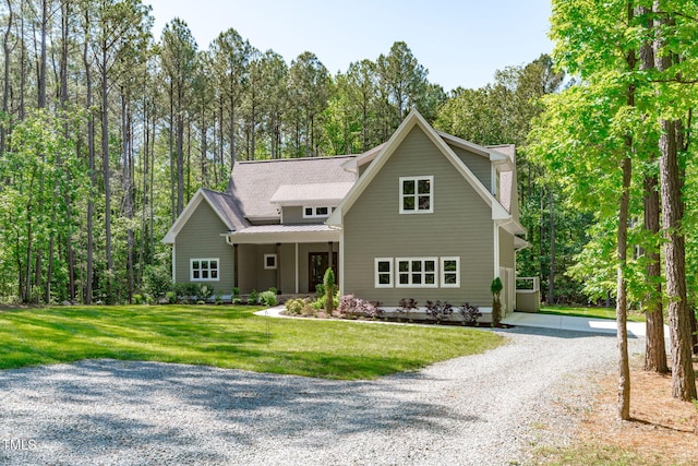 59 Mill Rd, Pittsboro, NC 27312 - view of front facade with driveway and a front lawn