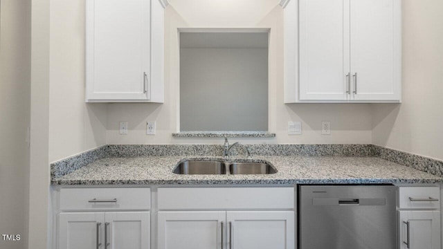412 Ember St, Sanford, NC 27330 - kitchen featuring a sink, white cabinetry, dishwasher, and light stone countertops
