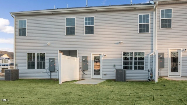 412 Ember St, Sanford, NC 27330 - back of house with a lawn and central AC unit