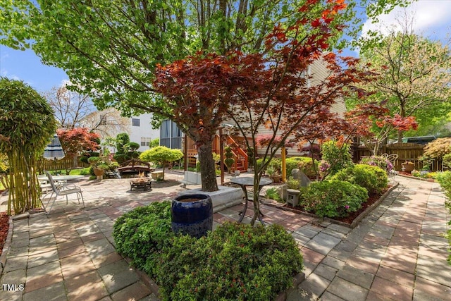 1012 Delta River Way, Knightdale, NC 27545 - view of home's community with a patio area and an outdoor fire pit