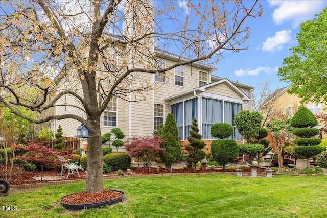 1012 Delta River Way, Knightdale, NC 27545 - back of property featuring a sunroom and a lawn