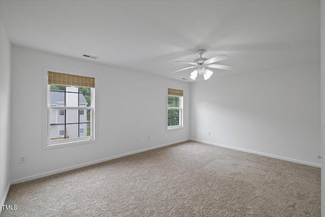 1012 Delta River Way, Knightdale, NC 27545 - carpeted empty room featuring plenty of natural light, baseboards, and ceiling fan