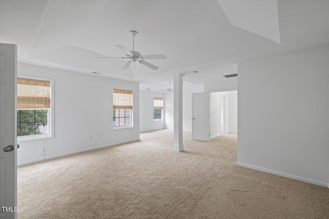 1012 Delta River Way, Knightdale, NC 27545 - unfurnished room featuring a ceiling fan, light colored carpet, a raised ceiling, and baseboards