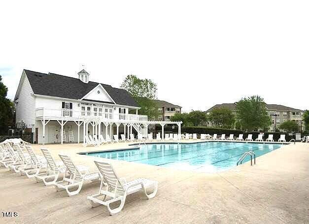1012 Delta River Way, Knightdale, NC 27545 - community pool featuring a patio