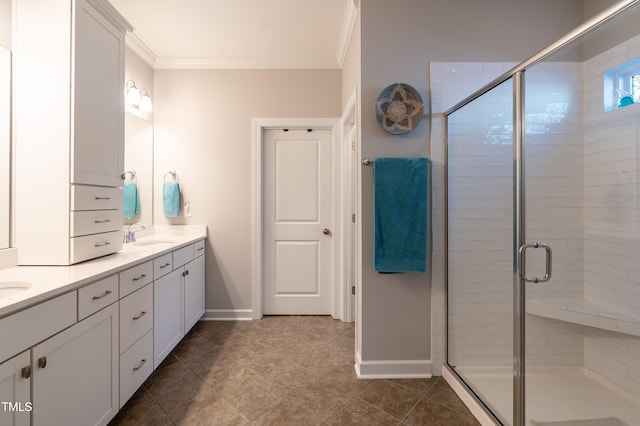 1013 Chelsea Run Ln, Apex, NC 27502 - full bathroom with double vanity, ornamental molding, a shower stall, baseboards, and tile patterned flooring