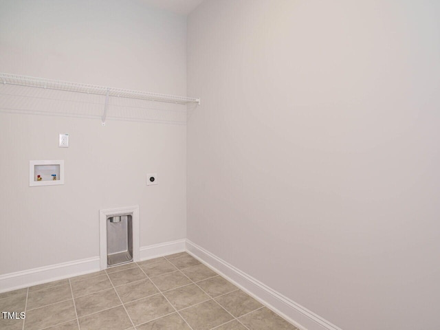 washroom featuring washer hookup, hookup for an electric dryer, laundry area, light tile patterned floors, and baseboards