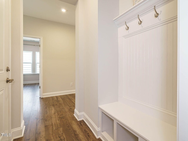 mudroom featuring recessed lighting, baseboards, and dark wood-style floors
