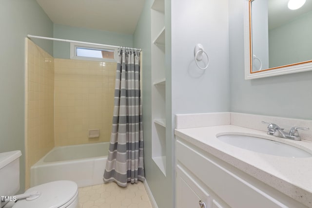 bathroom with vanity, tile patterned floors, shower / bath combo, and toilet