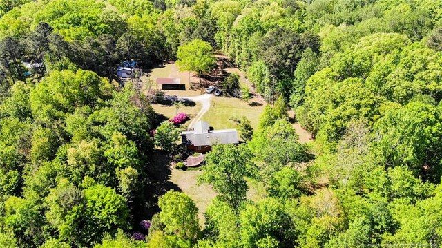 bird's eye view with a forest view