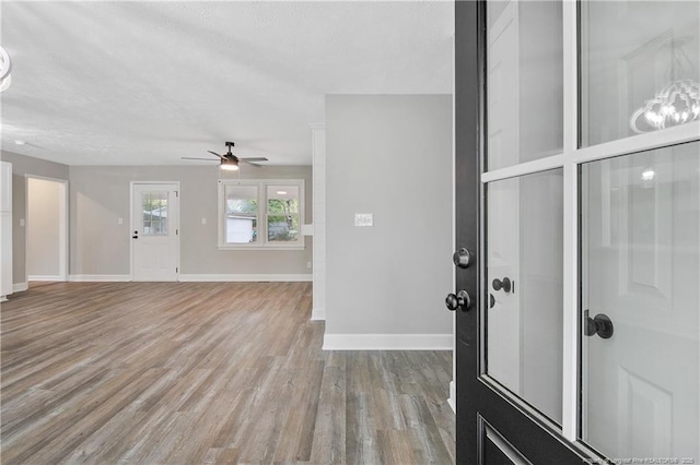 1833 Faber St, Fayetteville, NC 28304 - entrance foyer with wood finished floors, a ceiling fan, and baseboards
