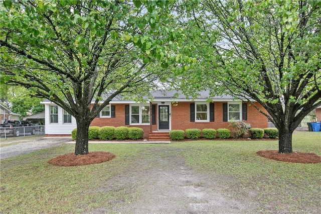 1833 Faber St, Fayetteville, NC 28304 - ranch-style house featuring brick siding and asphalt driveway