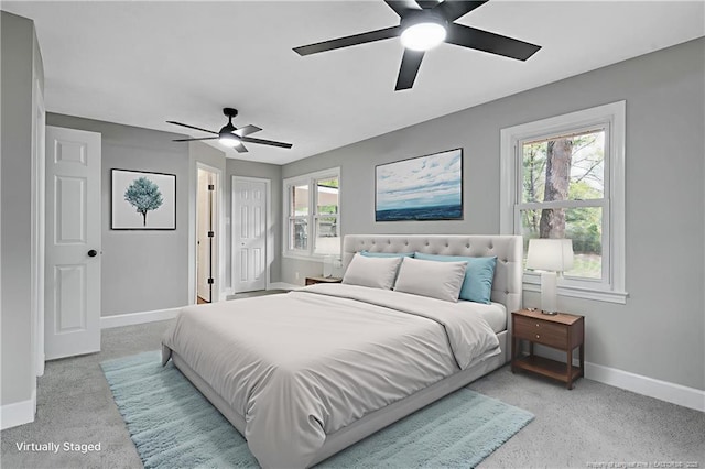 1833 Faber St, Fayetteville, NC 28304 - bedroom featuring multiple windows, light carpet, and a ceiling fan