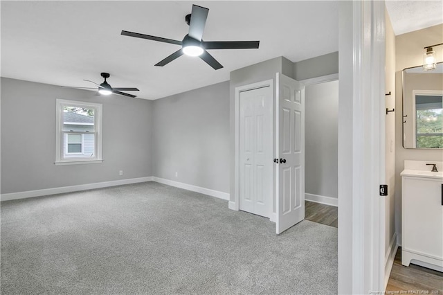 1833 Faber St, Fayetteville, NC 28304 - unfurnished bedroom with carpet floors, a ceiling fan, and a closet