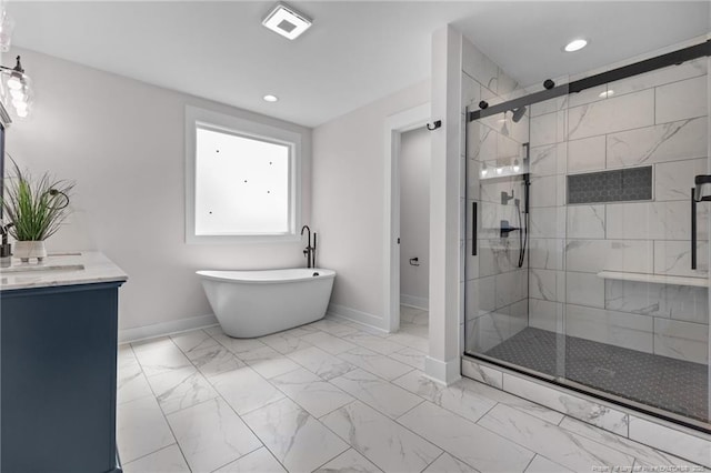 bathroom featuring recessed lighting, a stall shower, marble finish floor, baseboards, and a soaking tub