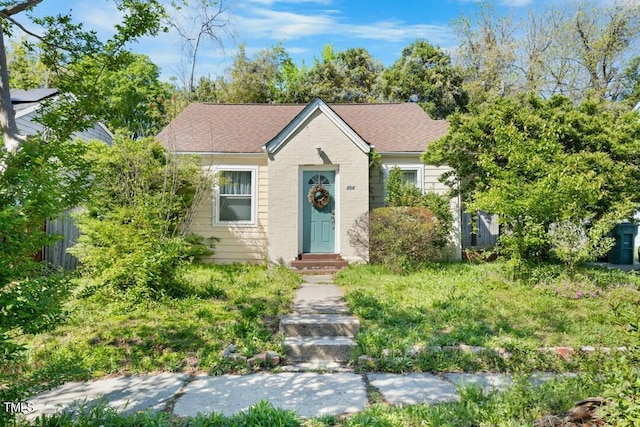214 Northwood Cir, Durham, NC 27701 - bungalow-style home with a shingled roof