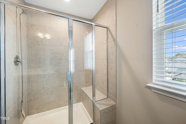 full bathroom with a shower stall