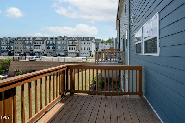 deck with a residential view and fence private yard