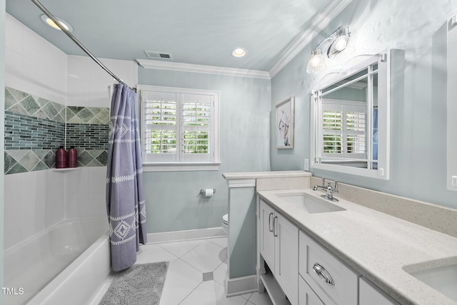 full bathroom with ornamental molding, visible vents, a wealth of natural light, and a sink