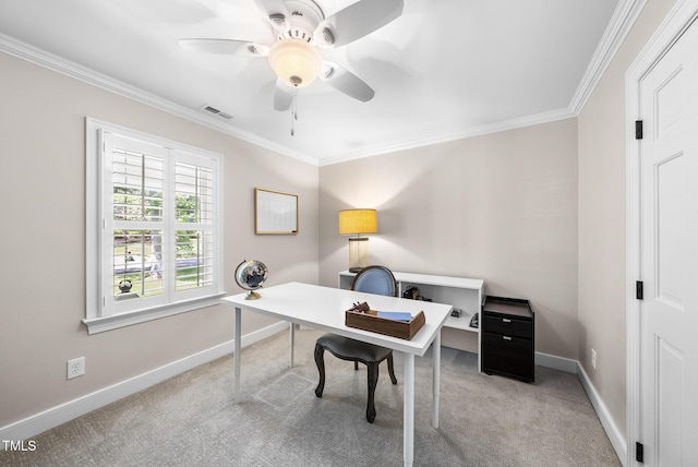 office space featuring crown molding, baseboards, visible vents, and carpet floors