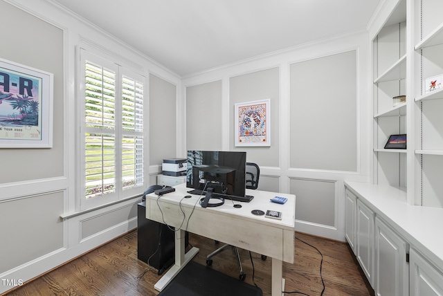 office featuring ornamental molding and a decorative wall