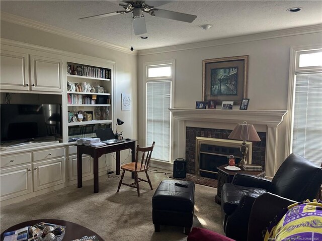 5400 Labrador Dr, Hope Mills, NC 28348 - home office featuring a ceiling fan, a fireplace, built in features, and a textured ceiling