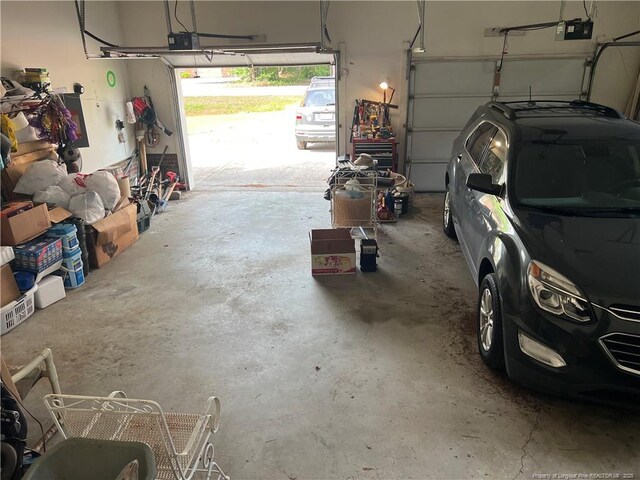 5400 Labrador Dr, Hope Mills, NC 28348 - garage featuring a garage door opener