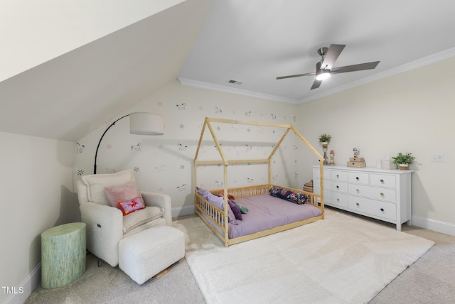 bedroom with visible vents, crown molding, lofted ceiling, ceiling fan, and carpet flooring