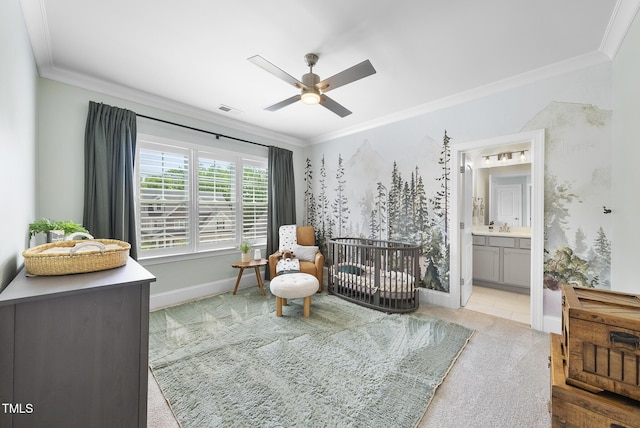 sitting room featuring visible vents, ornamental molding, baseboards, ceiling fan, and carpet flooring