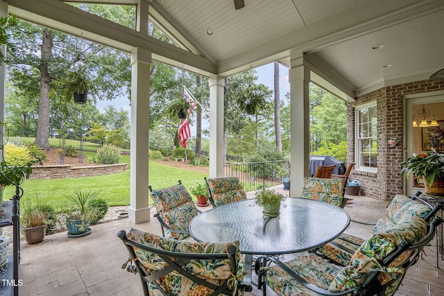 1605 Hunting Ridge Rd, Raleigh, NC 27615 - sunroom featuring a ceiling fan, a wealth of natural light, and outdoor dining area