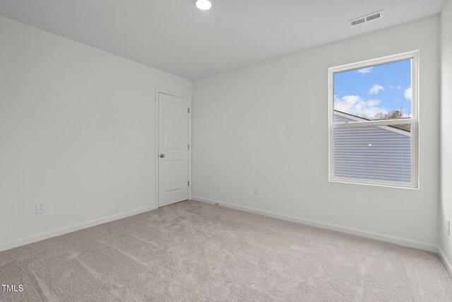 801 Kenyon Spring Dr, Zebulon, NC 27597 - carpeted spare room featuring baseboards