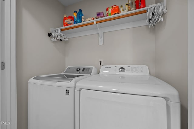 laundry area with independent washer and dryer and laundry area