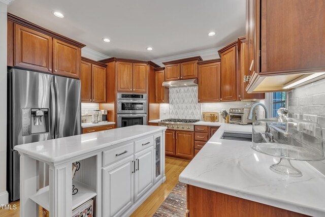 kitchen featuring open shelves, a sink, stainless steel appliances, a kitchen island, and under cabinet range hood