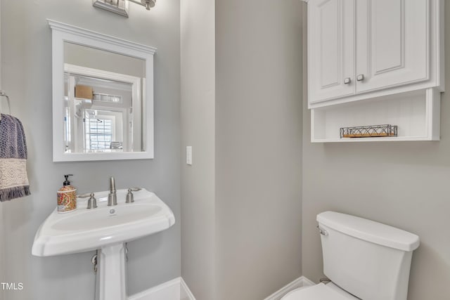 bathroom featuring toilet