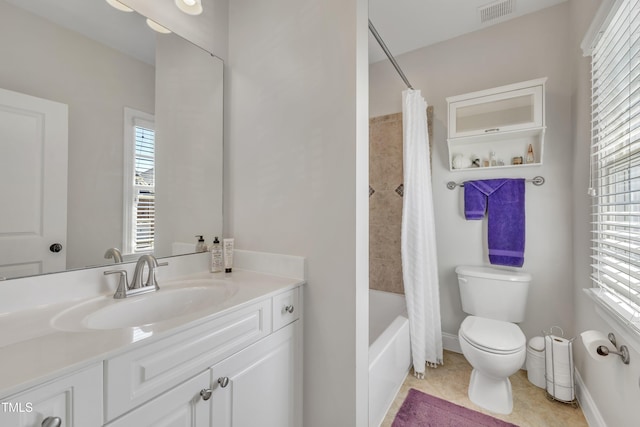 full bath with visible vents, plenty of natural light, tile patterned floors, and toilet