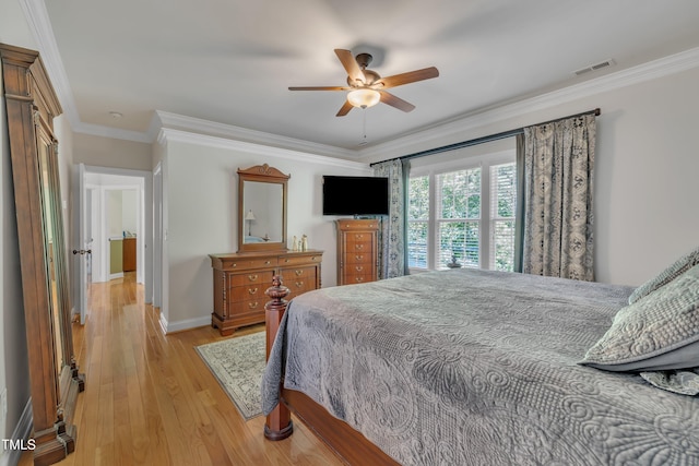 bedroom with ceiling fan, baseboards, light wood-type flooring, visible vents, and ornamental molding